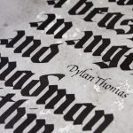 Detail of Dylan Thomas quote in gothic calligraphy